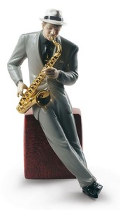 Casa Padrino Porzellan Skulptur Jazz Saxophonist Mehrfarbig 23 x H. 29 cm - Hangefertigte & Handbemalte Luxus Deko Figur