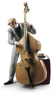 Casa Padrino Porzellan Skulptur Jazz Bassist Mehrfarbig 20 x H. 35 cm - Hangefertigte & Handbemalte Luxus Deko Figur