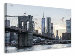 Leinwandbild Die Brooklyn Bridge am Abend