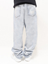 Supreme Baggy Jeans mit Supreme-Stickerei