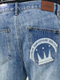 Jeans Shorts mit Coin Crown Print in Washed Denim
