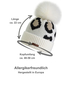 Modische Strickm�tze mit Bommel f�r kalte Tage