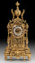 Casa Padrino Luxus Barock Tischuhr Gold 21 x H. 44 cm - Handgefertigte Bronze Uhr im Barockstil - Barock Schreibtischuhr - Barock Schreibtisch Deko - Barock Deko Accessoires - Barockstil Uhren 