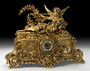 Casa Padrino Luxus Barock Tischuhr Gold 61 x 25 x H. 47 cm - Handgefertigte Barockstil Bronze Uhr - Barock Schreibtischuhr - Barock Schreibtisch Deko - Barock Deko Accessoires - Barockstil Uhren 