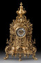 Casa Padrino Luxus Barock Tischuhr Gold 34 x H. 59 cm - Handgefertigte Bronze Uhr im Barockstil - Barock Schreibtischuhr - Barock Schreibtisch Deko - Barock Deko Accessoires - Barockstil Uhren 