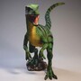Casa Padrino XXL Deko Skulptur Dinosaurier Velociraptor Gr�n / Schwarz 295 x H. 150 cm - Lebensgro�e Gartenfigur