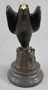 Casa Padrino Luxus Art Deco Bronze Figur Adler auf Felsen mit Marmorsockel Bronze / Gold / Schwarz 12 x 22 x H. 21 cm - Bronze Skulptur - Deko Figur - Deko Accessoires