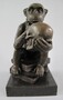 Casa Padrino Bronze Deko Figur Affe H. 14 cm - Bronze Skulptur - Deko Accessoires