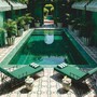 Casa Padrino Luxus Gartenliege mit Armlehnen Schwarz / Gr�n 198 cm - Hotel & Garten M�bel