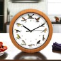Wanduhr mit 12 original Vogelstimmen und automatischer Nachtabschaltung (franz�sisch)