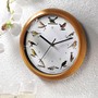 Wanduhr mit 12 original Vogelstimmen und automatischer Nachtabschaltung (franz�sisch)