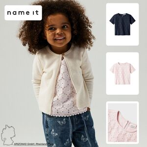 Kurz�rmeliges Oberteil mit Spitzenmuster und Saumdetails