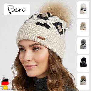 Modische Strickm�tze mit Bommel f�r kalte Tage