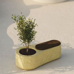 Casa Padrino Luxus Beton Gartenbank mit Blumentopf Gelb / Dunkelbraun 145 cm