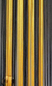 Fadenvorhang Kaikoon 150 cm x 250 schwarz-gelb in B1 schwer entflammbar