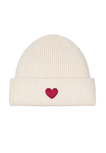 Gemusterte Strickm�tze mit Rippb�ndchen dezenter Stickerei 