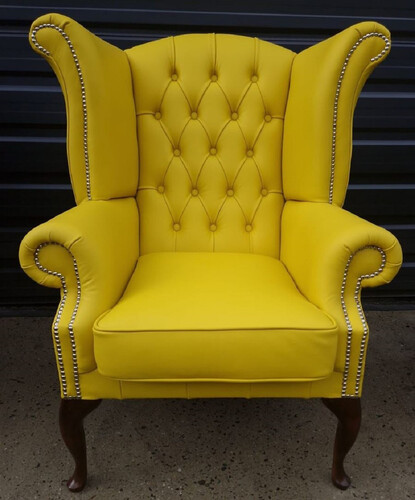 Casa Padrino Luxus Chesterfield Ohrensessel Gelb / Dunkelbraun 98 x 90 x H. 110 cm - Echtleder Chesterfield Wohnzimmer Sessel - Wohnzimmer M�bel - Chesterfield M�bel - Luxus Leder M�bel