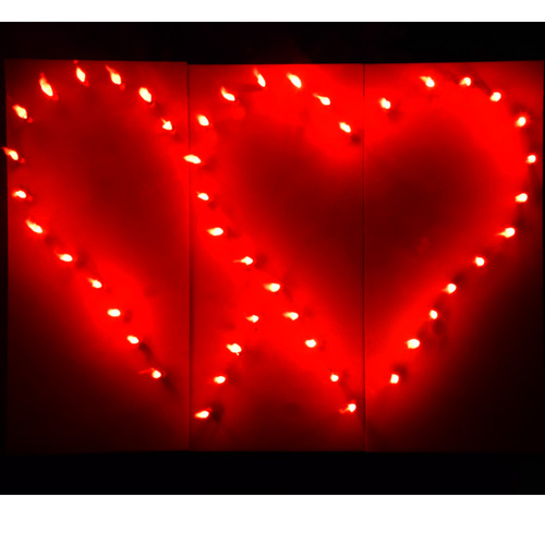 Lichterbild brennendes rotes Doppelherz