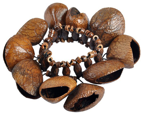 Rassel aus Pangi Fr�chten f�r einen dunkleren Ton - mit einem elastischen Band zum �berstreifen 