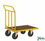 Gelber, pulverlackierter Plattformwagen mit Feststeller 